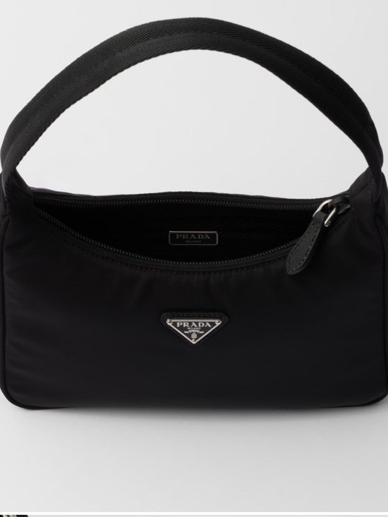 Prada Handbags - Re- nylon Prada Tessuto. Perfect for on the go or even a night out. Gently used